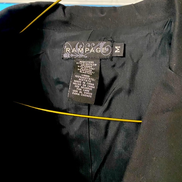 Black with White trim jacket. Short sleeved. - Picture 3 of 3